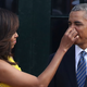First lady Michelle Obama and U.S. President Barack Obama on the South Lawn of the White House August 2, 2016 in Washington, DC.